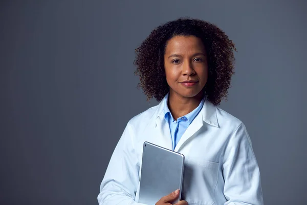 Studio Portrait Female Doctor Lab Coat Holding Digital Tablet — 스톡 사진