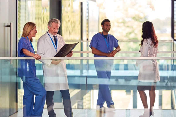 Multi Cultural Medical Team Wearing White Coats Scrubs Discuss Patient — Stock Photo, Image