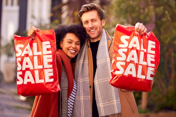 Portrait Multi Cultural Couple Sale Shopping City Carrying Bags Fall — Stock Photo, Image
