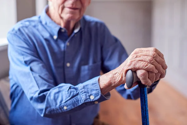 Close Senior Man Home Resting Hands Walking Stick — 스톡 사진