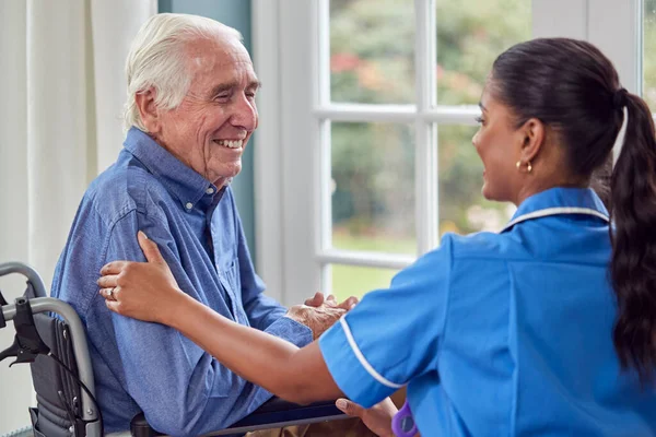 Female Care Worker Uniform Talking Senior Man Sitting Wheelchair Care — Foto Stock