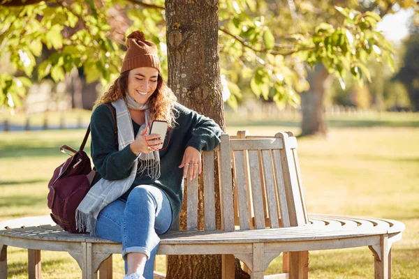 Smiling Young Woman Wearing Hat Scarf Sitting Bench Autumn Park — Stok fotoğraf