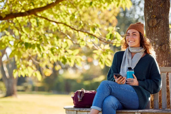 Smiling Young Woman Wearing Hat Scarf Sitting Bench Autumn Park —  Fotos de Stock