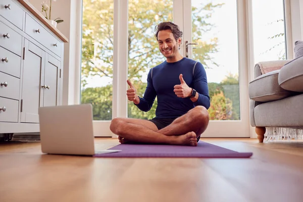 Mature Male Teacher Sitting Mat Home Laptop Giving Online Yoga — 스톡 사진