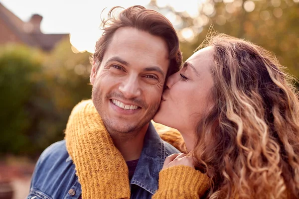Portrait Happy Loving Couple Woman Giving Man Kiss Cheek — Stok fotoğraf