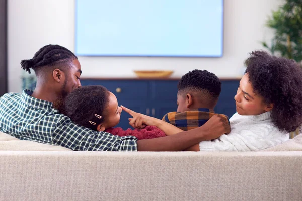 Rear View Family Sitting Sofa Watching Movie Home — Stockfoto