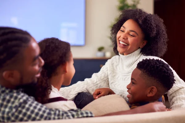 Family Sitting Sofa Having Fun Watching Movie Home — Stock Fotó