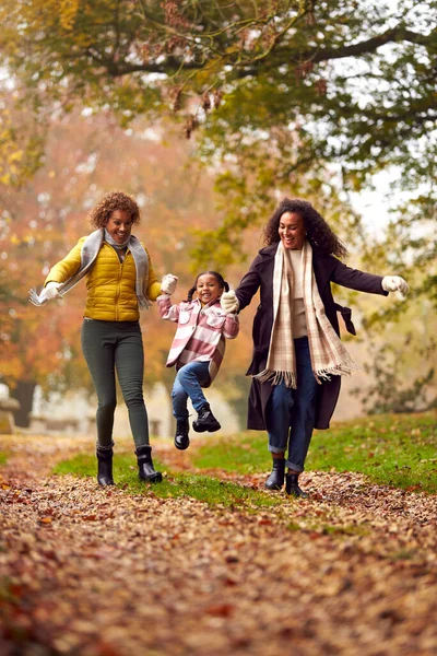 Multi Generation Female Family Swinging Granddaughter Walk Autumn Countryside Together — Stok fotoğraf