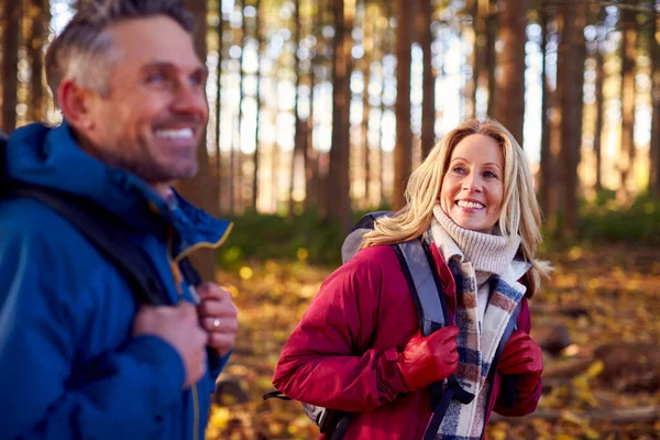 Side View Mature Retired Couple Backpacks Walking Fall Winter Countryside — Stock Photo, Image