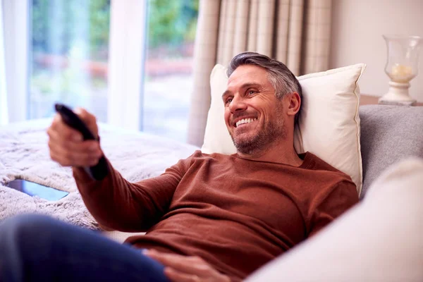 Mature Man Home Relaxing Sofa Watching Using Remote Control — 스톡 사진