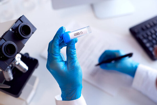 Close Lab Worker Doing Test Using Microscope Holding Test Tube Stock Photo