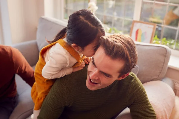 Family Two Dads Playing Game Daughter Home Whispering Secret Parent — Fotografia de Stock