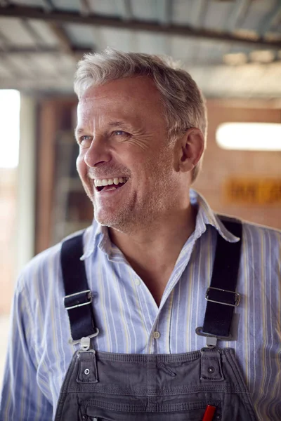 Portrait Smiling Mature Male Wearing Overalls Garage Workshop — Fotografia de Stock