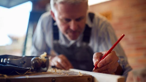 Mature Male Carpenter Garage Workshop Marking Wood Pencil — Fotografia de Stock