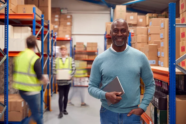 Portrait Manager Digital Tablet Busy Modern Warehouse Staff Background — Photo