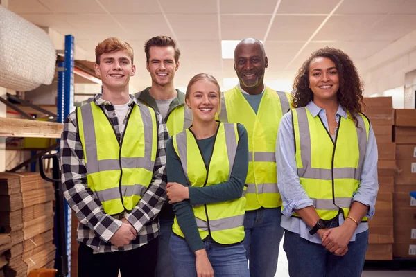 Portrait Multi Cultural Team Wearing Vis Safety Clothing Modern Warehouse — 스톡 사진