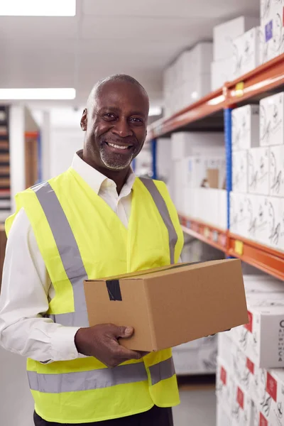 Portrait Smiling Male Worker Holding Box Warehouse — Stock Photo, Image