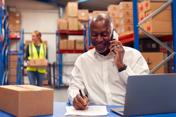 Male Team Leader Working Laptop Talking Mobile Phone — Fotografia de Stock