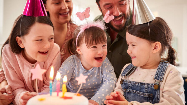Family Syndrome Daughter Celebrating Birthday Party Home Together Stock Picture