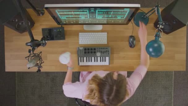 Overhead View Female Musician Workstation Keyboard Microphone Putting Headphones Turning — Wideo stockowe