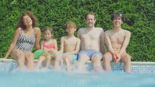 Portrait Multi Racial Family Relaxing Sitting Edge Swimming Pool Summer — Video Stock