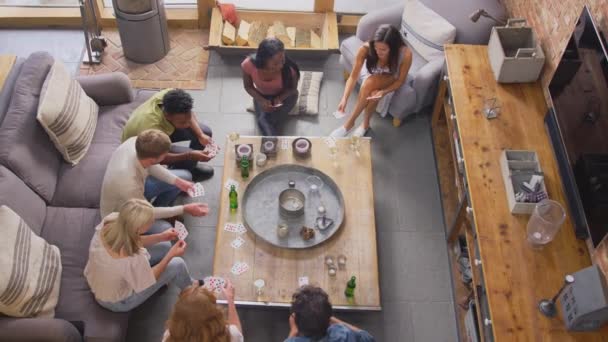 Overhead Shot Multi Cultural Group Friends Home Playing Cards Drinking — Vídeo de Stock