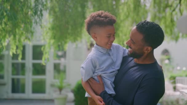 Portrait Loving Father Holding Son Arms Hugging Talking Garden Together — Vídeos de Stock