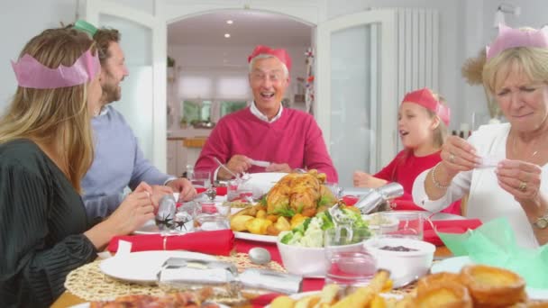 Family Paper Hats Gifts Christmas Crackers Sitting Table Christmas Meal — Video