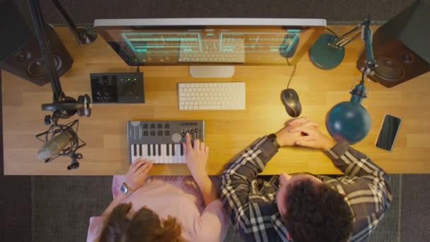 Overhead View Male Female Musicians Workstation Keyboard Microphone Studio Night — Vídeo de stock