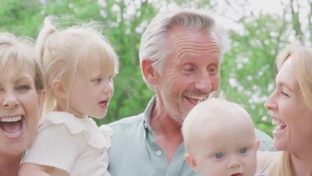 Camera Tracks Faces Smiling Grandparents Mother Grandchildren Home Garden Together — 图库视频影像