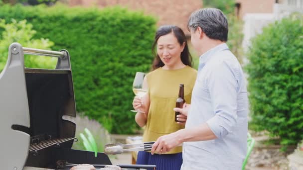 Loving Mature Couple Cooking Outdoor Barbeque Making Toast Wine Beer — Vídeos de Stock