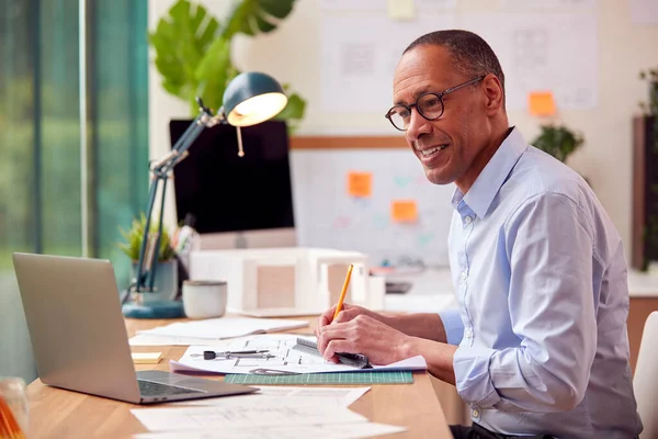 Mature Male Architect Working Office Model Desk Studying Plans New — Stock Photo, Image