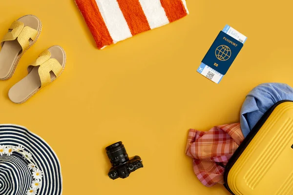 Flat Lay Shot Yellow Suitcase Unpacked Holiday Accessories Yellow Background — Stock Photo, Image