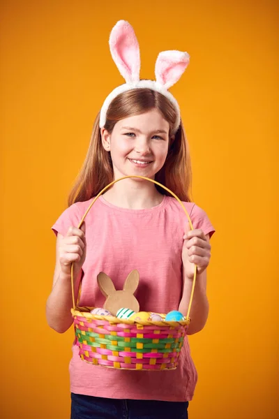 Studio Shot Girl Wearing Rabbit Ears Holding Basket Easter Eggs — 스톡 사진