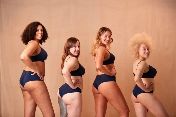 Group Of Diverse Women Friends One With Prosthetic Limb In Underwear Promoting Body Positivity