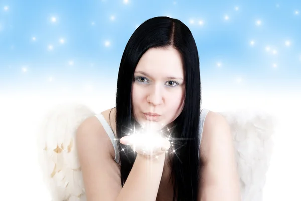 Angel blows some stars — Stock Photo, Image