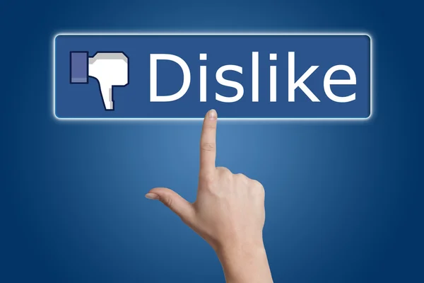 Pressing dislike button — Stock Photo, Image