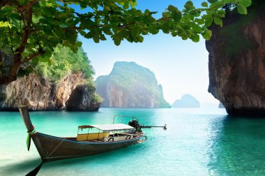 boat on small island in Thailand clipart