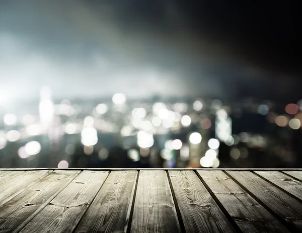 Wooden platform and lights of night Hong Kong — Stock Photo, Image