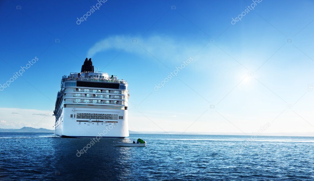 Caribbean sea and cruise ship in sunset time