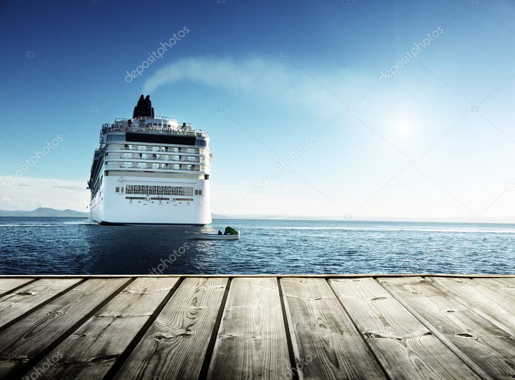 Caribbean sea and cruise ship and wood pier