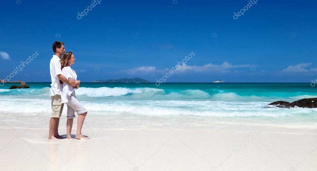Man and woman romantic couple on tropical beach