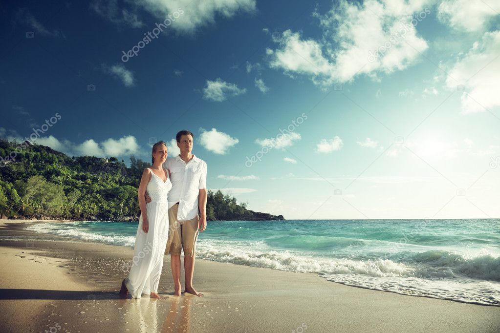 man and woman romantic couple on tropical beach 