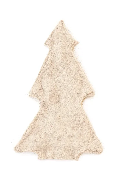 Häufchen gemahlener weißer Pfeffer isoliert in Weihnachtsbaumform — Stockfoto