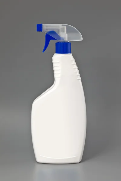 White detergent plastic spray bottle Isolated on gray — Stock Photo, Image