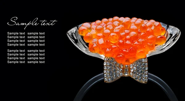 Red caviar in glass isolated on black — Stock Photo, Image