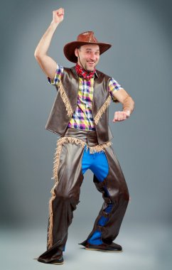 kovboy sürmek ve gülümsedi