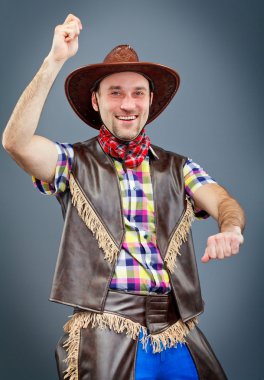 kovboy sürmek ve gülümsedi