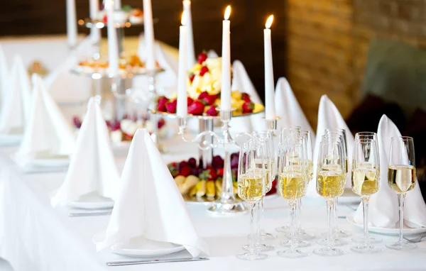 Romantic table with burning candles and champagne — Stock Photo, Image