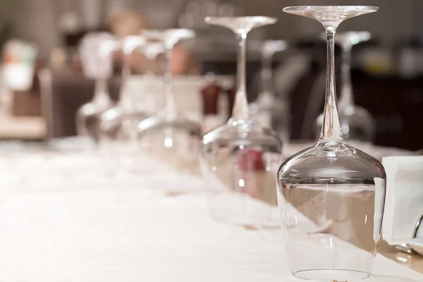 Empty glasses set in restaurant — Stock Photo, Image